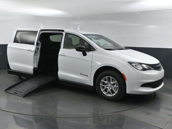 White Chrysler Voyager with BraunAbility Side Entry Manual Fold Out conversion