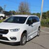 White Chrysler Pacifica with BraunAbility Side Entry Automatic Fold Out conversion