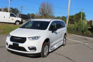 White Chrysler Pacifica with BraunAbility Side Entry Automatic Fold Out conversion