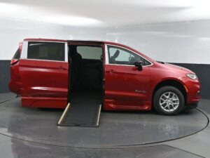 Red Chrysler Pacifica with BraunAbility Side Entry Automatic In Floor conversion