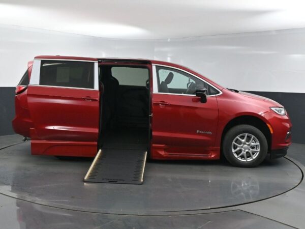 Red Chrysler Pacifica with BraunAbility Side Entry Automatic In Floor conversion