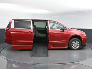 Red Chrysler Pacifica with BraunAbility Side Entry Automatic Fold Out conversion