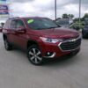 Red Chevrolet Traverse with Freedom Motors Rear Entry Automatic Fold Out conversion