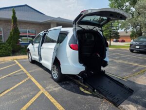 White Chrysler Voyager with FR Conversions Rear Entry Manual Fold Out conversion