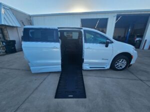 White Chrysler Pacifica with BraunAbility Side Entry Automatic Fold Out conversion