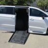 White Chrysler Pacifica with BraunAbility Side Entry Automatic Fold Out conversion