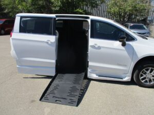 White Chrysler Pacifica with BraunAbility Side Entry Automatic Fold Out conversion