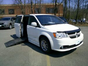 White Dodge Grand Caravan with BraunAbility Side Entry Automatic Fold Out conversion