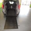 Silver Dodge Grand Caravan with BraunAbility Rear Entry Automatic Fold Out conversion