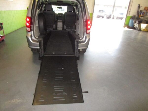 Silver Dodge Grand Caravan with BraunAbility Rear Entry Automatic Fold Out conversion