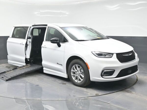 White Chrysler Pacifica with BraunAbility Side Entry Automatic Fold Out conversion