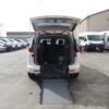 White Chrysler Voyager with Driverge Rear Entry Manual Fold Out conversion
