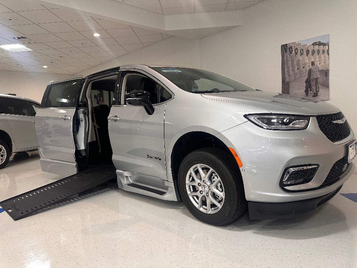 Silver Chrysler Pacifica with BraunAbility Side Entry Automatic In Floor conversion