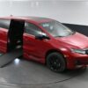 Red Honda Odyssey with BraunAbility Side Entry Automatic In Floor conversion