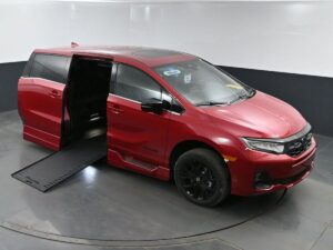 Red Honda Odyssey with BraunAbility Side Entry Automatic In Floor conversion