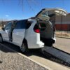 White Chrysler Voyager with BraunAbility Side Entry Automatic Fold Out conversion