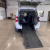 White Chrysler Town and Country with Adaptive Vans Side Entry Manual Fold Out conversion