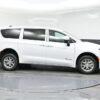 White Chrysler Voyager with BraunAbility Rear Entry Manual Fold Out conversion
