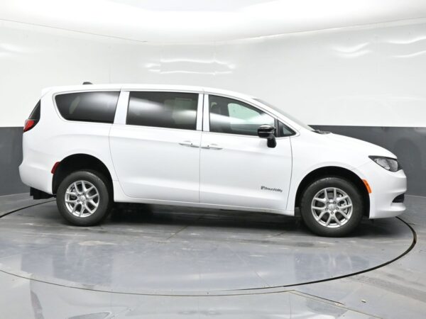White Chrysler Voyager with BraunAbility Rear Entry Manual Fold Out conversion