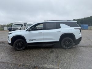 White Chevrolet Traverse with BraunAbility Side Entry Automatic In Floor conversion