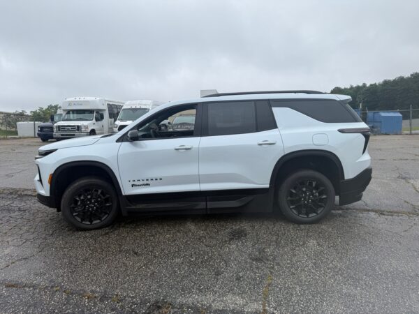 White Chevrolet Traverse with BraunAbility Side Entry Automatic In Floor conversion
