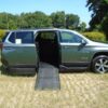 Silver Chevrolet Traverse with BraunAbility Side Entry Automatic In Floor conversion