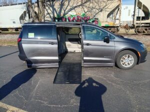 Grey Chrysler Voyager with BraunAbility Side Entry Automatic Fold Out conversion