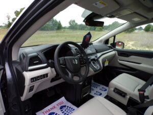 Grey Honda Odyssey with BraunAbility Side Entry Automatic In Floor conversion