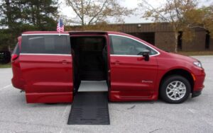 Red Chrysler Pacifica with BraunAbility Side Entry Automatic Fold Out conversion