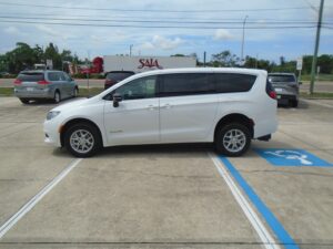 White Chrysler Voyager with BraunAbility Rear Entry Manual Fold Out conversion