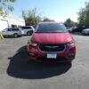 Red Chrysler Pacifica with Driverge Side Entry Automatic Fold Out conversion