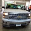White Chevrolet Silverado 1500 with MobilitySVM Side Entry Automatic Fold Out conversion