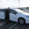 White Chrysler Voyager with Driverge Side Entry Automatic Fold Out conversion