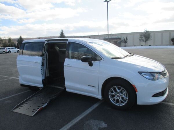 White Chrysler Voyager with Driverge Side Entry Automatic Fold Out conversion