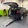 Black Chrysler Voyager with Driverge Rear Entry Manual Fold Out conversion