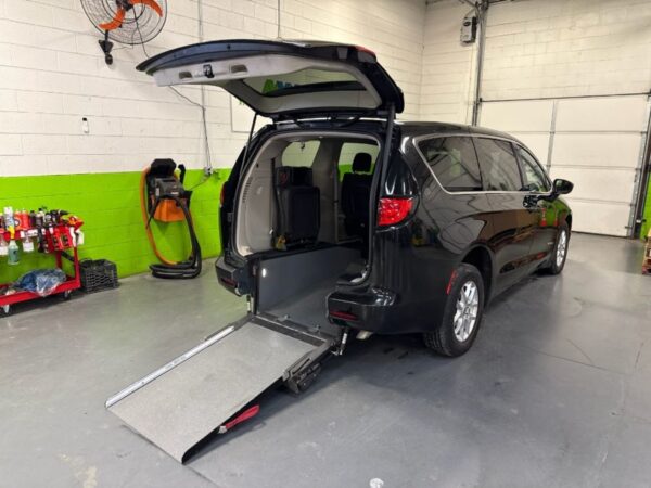 Black Chrysler Voyager with Driverge Rear Entry Manual Fold Out conversion