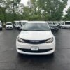 White Chrysler Voyager with BraunAbility Rear Entry Manual Fold Out conversion