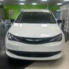 White Chrysler Voyager with Driverge Rear Entry Manual Fold Out conversion