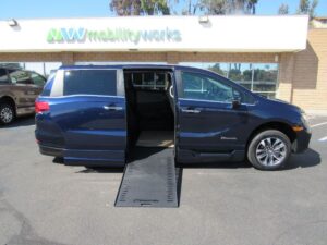 Blue Honda Odyssey with BraunAbility Side Entry Automatic In Floor conversion