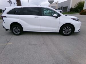 White Toyota Sienna with Driverge Rear Entry Manual Fold Out conversion