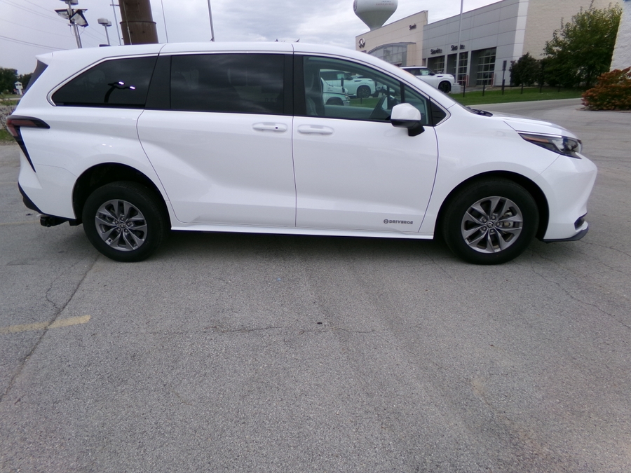 White Toyota Sienna with Driverge Rear Entry Manual Fold Out conversion