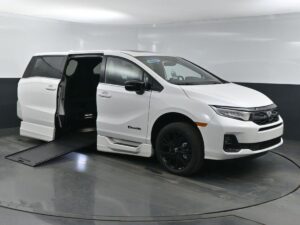 White Honda Odyssey with BraunAbility Side Entry Automatic In Floor conversion