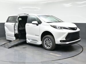 White Toyota Sienna with BraunAbility Side Entry Automatic Fold Out conversion