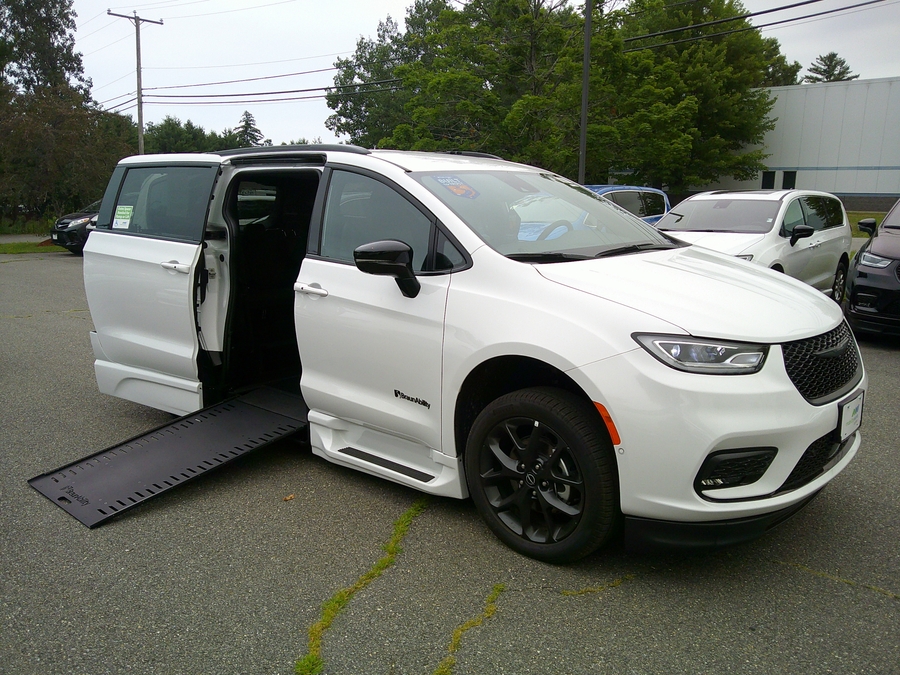 White Chrysler Pacifica with BraunAbility Side Entry Automatic In Floor conversion