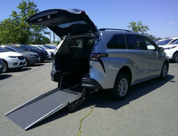 Silver Toyota Sienna with Driverge Rear Entry Manual Fold Out conversion