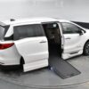 White Honda Odyssey with BraunAbility Side Entry Automatic In Floor conversion