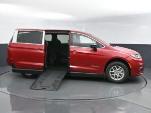 Red Chrysler Pacifica with BraunAbility Side Entry Manual Fold Out conversion