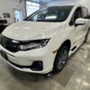 White Honda Odyssey with BraunAbility Side Entry Automatic In Floor conversion