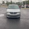 Silver Dodge Grand Caravan with Driverge Side Entry Automatic Fold Out conversion