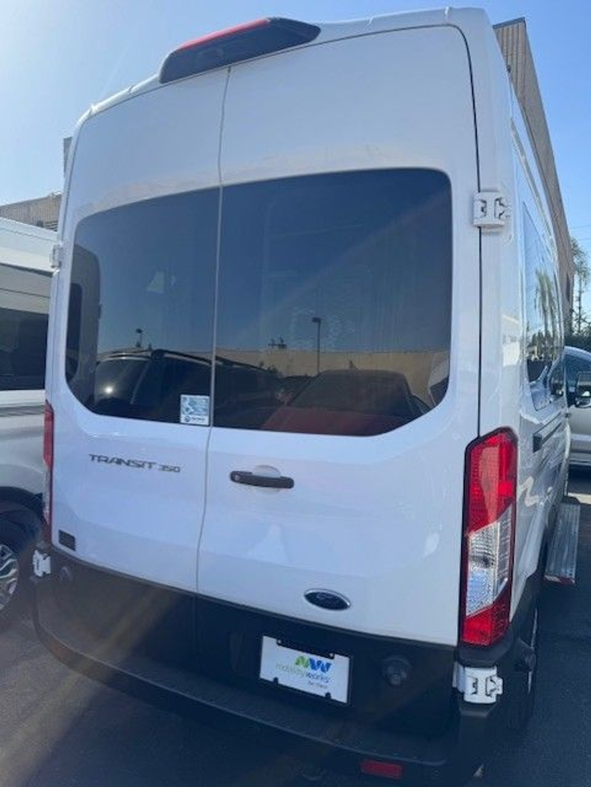 White Ford T350 with Other Rear Entry Automatic Fold Out conversion